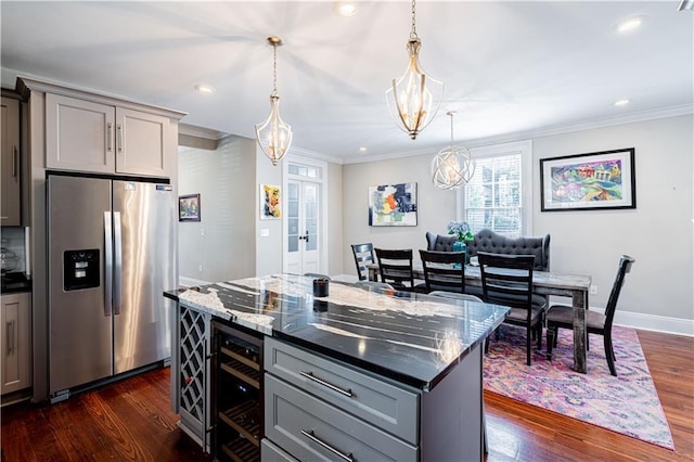 2134 Harmony St, New Orleans, LA 70115 - kitchen with stainless steel refrigerator with ice dispenser, gray cabinetry, wine cooler, dark wood-style flooring, and ornamental molding
