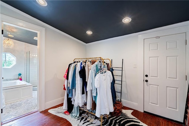 2134 Harmony St, New Orleans, LA 70115 - spacious closet featuring wood finished floors