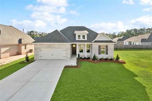 72665 Robindale Dr, Covington, LA 70434 - view of front of property featuring brick siding, an attached garage, driveway, and a shingled roof