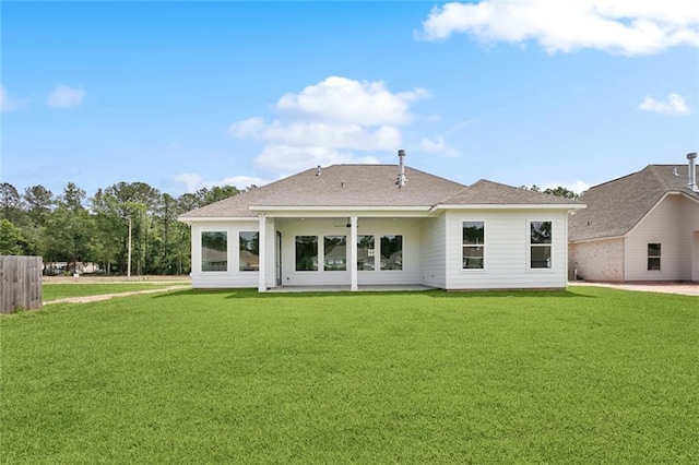 72665 Robindale Dr, Covington, LA 70434 - back of property with a yard, a shingled roof, and a patio