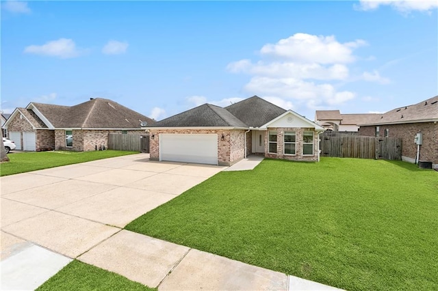 121 Gail Dr, La Place, LA 70068 - view of front of home with brick siding, concrete driveway, and a garage
