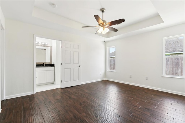 121 Gail Dr, La Place, LA 70068 - empty room featuring a raised ceiling, plenty of natural light, and ceiling fan