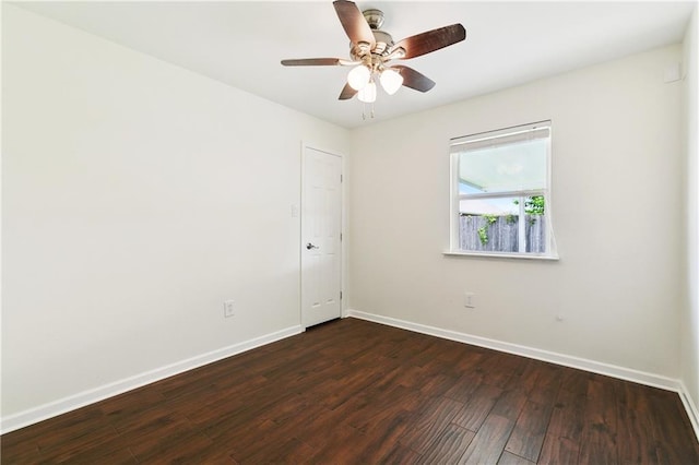 121 Gail Dr, La Place, LA 70068 - unfurnished room featuring dark wood-type flooring, baseboards, and a ceiling fan