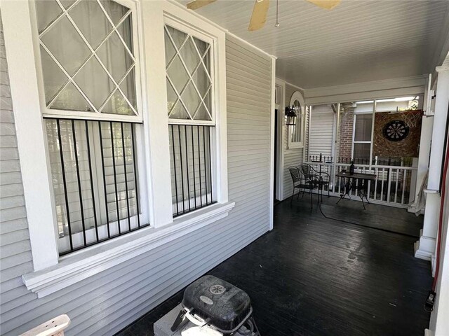 1228 Pine St, New Orleans, LA 70118 - covered porch featuring ceiling fan