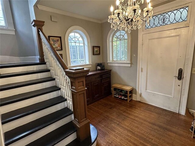 1228 Pine St, New Orleans, LA 70118 - foyer entrance featuring stairway, a chandelier, dark wood-style floors, ornamental molding, and baseboards