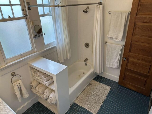 1228 Pine St, New Orleans, LA 70118 - full bathroom with shower / bath combo and tile patterned floors