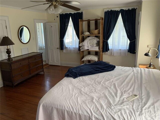 1228 Pine St, New Orleans, LA 70118 - bedroom featuring hardwood / wood-style flooring, ornamental molding, baseboards, and a ceiling fan