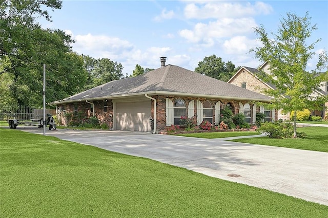 335 Devon Rd, La Place, LA 70068 - ranch-style house featuring a garage, a front lawn, driveway, a shingled roof, and brick siding