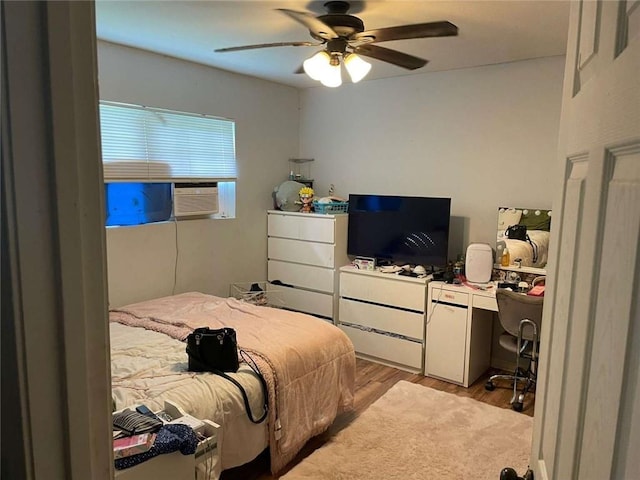 1127 Cousin St, Slidell, LA 70458 - bedroom with light wood-style flooring, a ceiling fan, cooling unit, and an office area