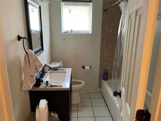 1127 Cousin St, Slidell, LA 70458 - bathroom featuring toilet, tile patterned floors, vanity, and shower / tub combo with curtain