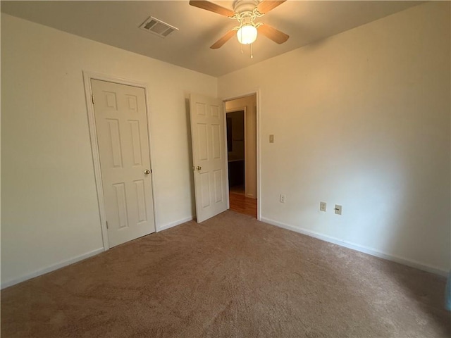 106 Leonell Cir, Slidell, LA 70458 - unfurnished bedroom featuring carpet flooring, baseboards, and a ceiling fan