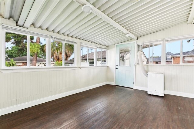 2008 Taft Park, Metairie, LA 70001 - unfurnished sunroom featuring wood finished floors, baseboards, and healthy amount of natural light