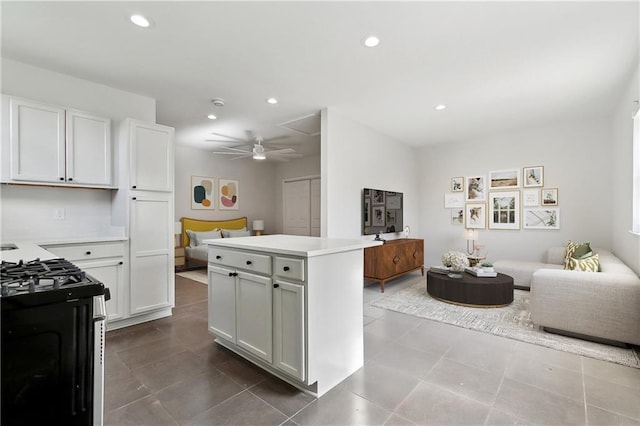 2008 Taft Park, Metairie, LA 70001 - kitchen featuring open floor plan, gas range oven, light countertops, a ceiling fan, and recessed lighting