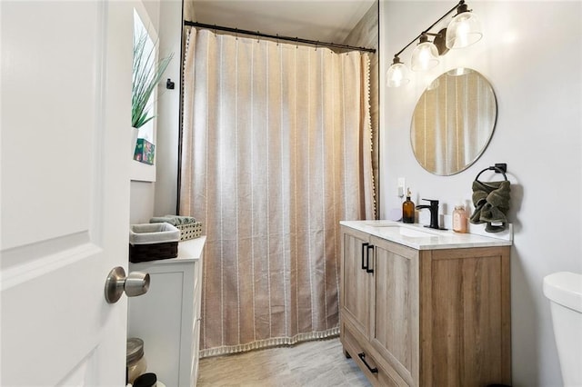 4409 Annette St, New Orleans, LA 70122 - bathroom with vanity, toilet, and curtained shower