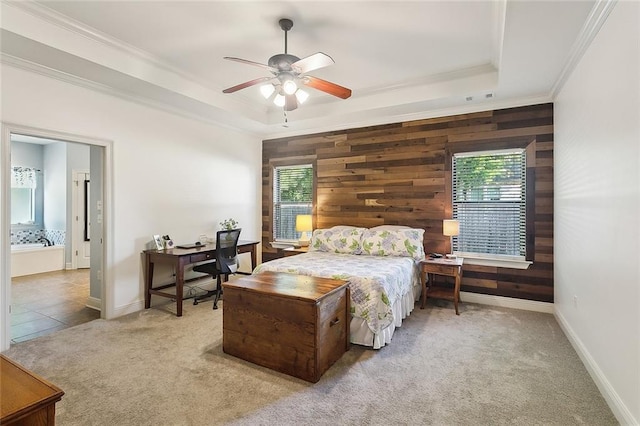 229 Pine Crest Dr, Madisonville, LA 70447 - bedroom featuring wood walls, a tray ceiling, carpet, a desk, and crown molding