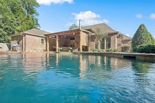 229 Pine Crest Dr, Madisonville, LA 70447 - swimming pool featuring a patio and a water view