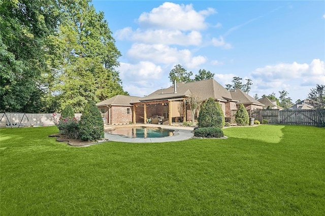 229 Pine Crest Dr, Madisonville, LA 70447 - rear view of house with brick siding and a patio area