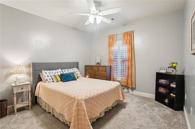 229 Pine Crest Dr, Madisonville, LA 70447 - carpeted bedroom with baseboards and ceiling fan