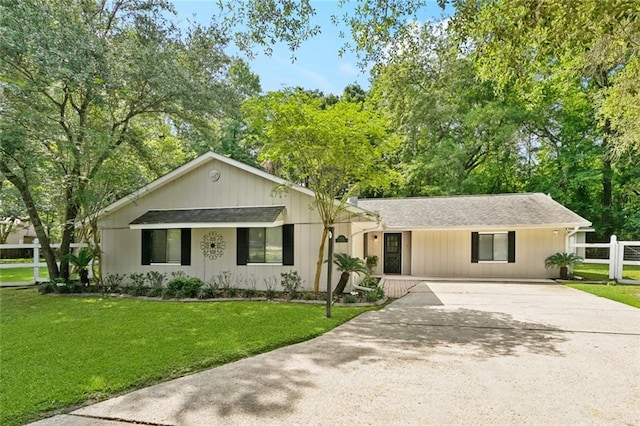 71152 Cutter Pl, Abita Springs, LA 70420 - view of front facade featuring concrete driveway and roof with shingles