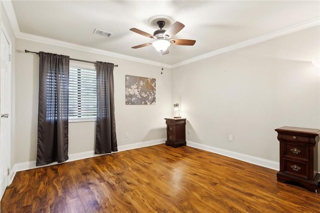 71152 Cutter Pl, Abita Springs, LA 70420 - spare room featuring ceiling fan, wood finished floors, crown molding, and baseboards