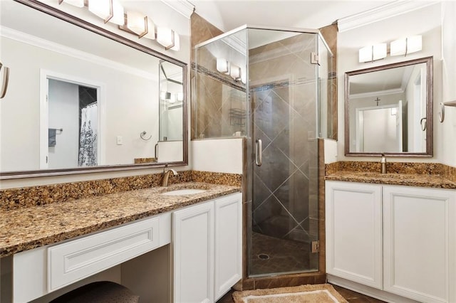 71152 Cutter Pl, Abita Springs, LA 70420 - bathroom featuring a shower stall, two vanities, and ornamental molding