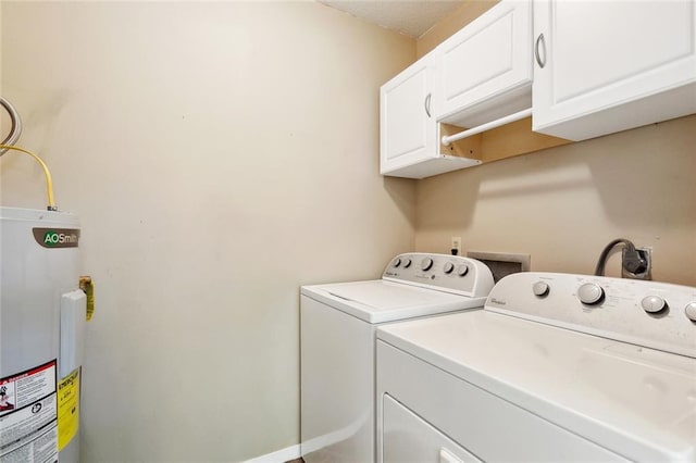 71152 Cutter Pl, Abita Springs, LA 70420 - washroom featuring cabinet space, washing machine and clothes dryer, and electric water heater