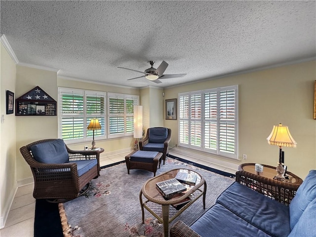 177 Moonraker Dr, Slidell, LA 70458 - tiled living area with ceiling fan, ornamental molding, baseboards, and a textured ceiling