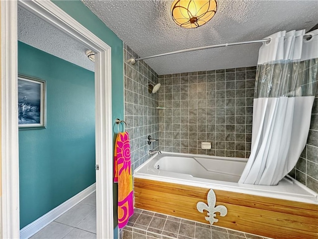 177 Moonraker Dr, Slidell, LA 70458 - bathroom featuring tile patterned floors, a textured ceiling, shower / bath combo, and baseboards