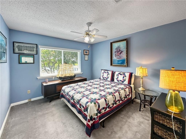 177 Moonraker Dr, Slidell, LA 70458 - carpeted bedroom with baseboards, a textured ceiling, and a ceiling fan
