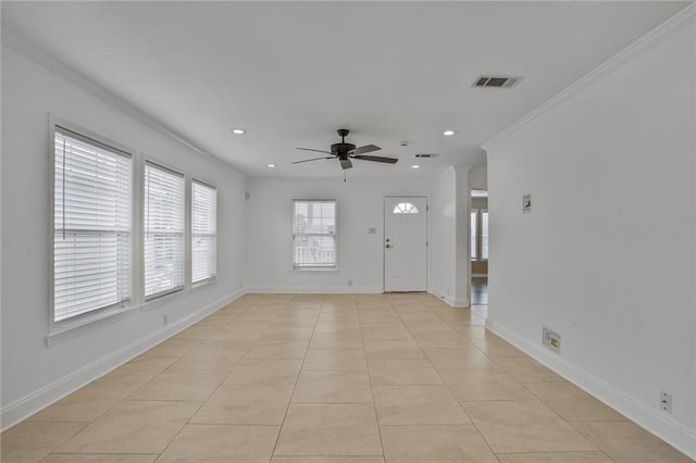 227 20th St, New Orleans, LA 70124 - unfurnished room featuring ceiling fan, recessed lighting, ornamental molding, baseboards, and light tile patterned floors