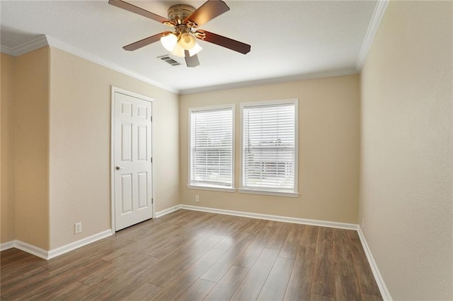 227 20th St, New Orleans, LA 70124 - empty room featuring baseboards, ceiling fan, crown molding, and wood finished floors
