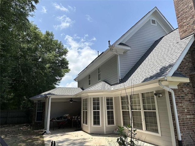 108 Riverbirch Dr, Lafayette, LA 70508 - back of house with a ceiling fan, a patio area, brick siding, and roof with shingles