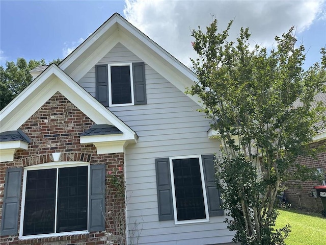 108 Riverbirch Dr, Lafayette, LA 70508 - view of side of home with brick siding