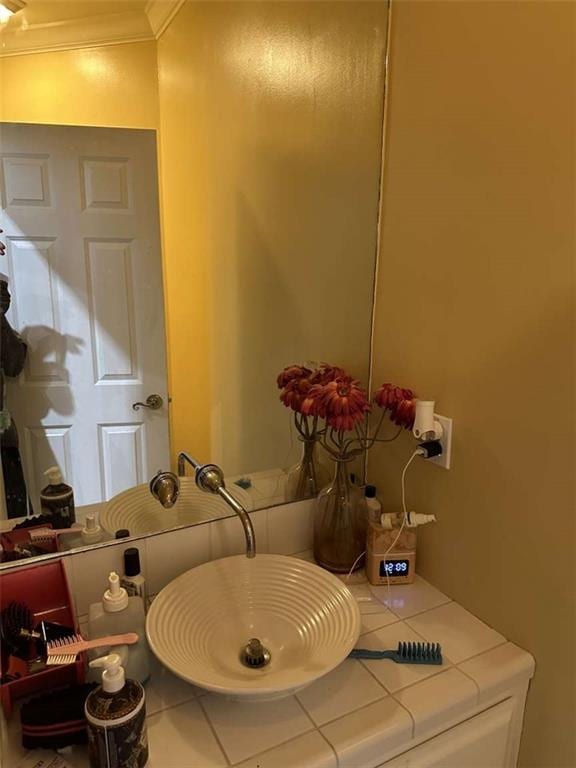 108 Riverbirch Dr, Lafayette, LA 70508 - bathroom featuring a sink and crown molding