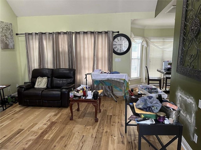 108 Riverbirch Dr, Lafayette, LA 70508 - living room featuring wood finished floors, crown molding, and baseboards