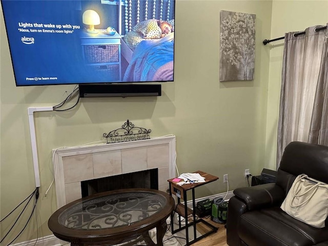 108 Riverbirch Dr, Lafayette, LA 70508 - living room with a tiled fireplace and wood finished floors
