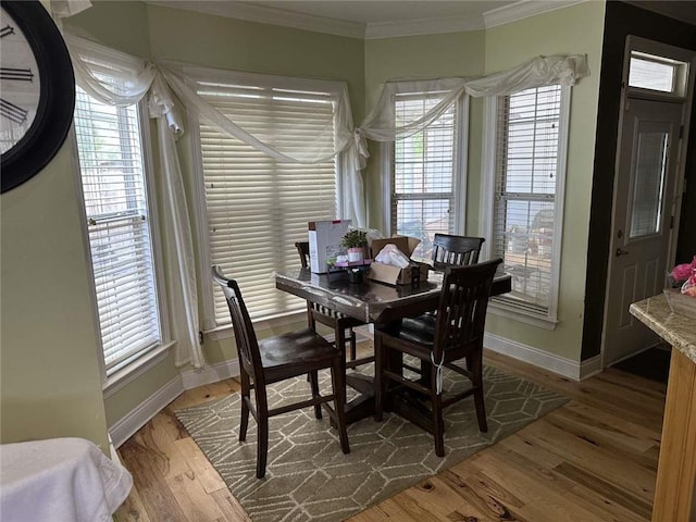 108 Riverbirch Dr, Lafayette, LA 70508 - dining room featuring ornamental molding, baseboards, and wood finished floors