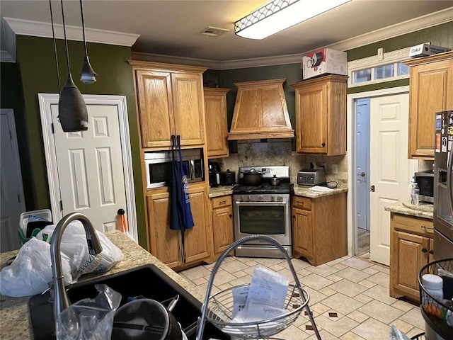 108 Riverbirch Dr, Lafayette, LA 70508 - kitchen featuring premium range hood, appliances with stainless steel finishes, decorative backsplash, a sink, and crown molding