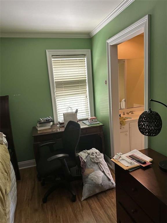 108 Riverbirch Dr, Lafayette, LA 70508 - office area featuring dark wood finished floors, ornamental molding, and baseboards