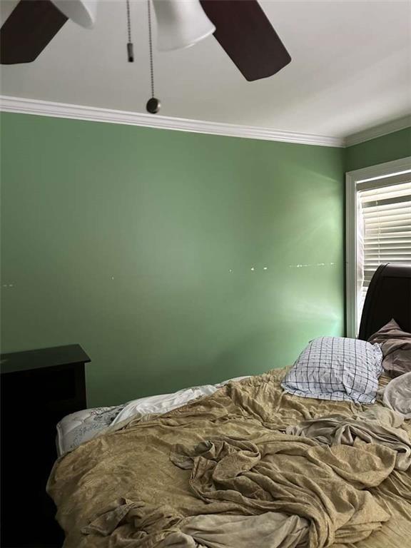 108 Riverbirch Dr, Lafayette, LA 70508 - bedroom featuring crown molding and a ceiling fan