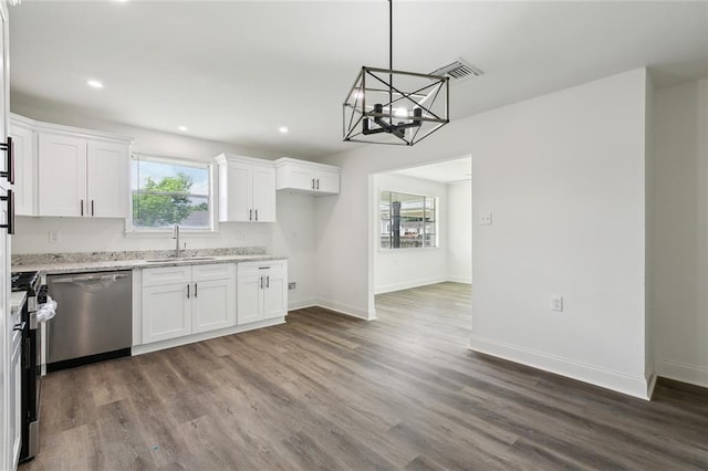 636 Oak Ave, Bridge City, LA 70094 - kitchen with stainless steel appliances, a sink, dark wood-style floors, white cabinets, and recessed lighting