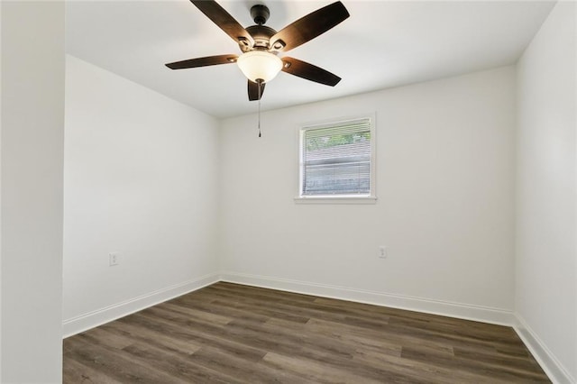 636 Oak Ave, Bridge City, LA 70094 - unfurnished room with baseboards, dark wood finished floors, and ceiling fan