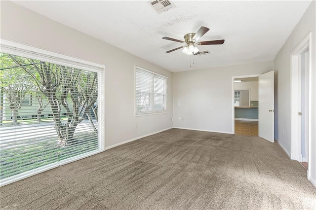 501 Gaudet Dr, Marrero, LA 70072 - empty room with carpet, baseboards, and a ceiling fan