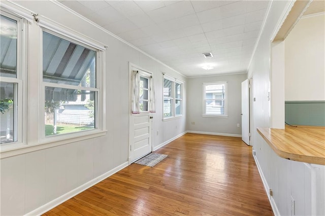 501 Gaudet Dr, Marrero, LA 70072 - entrance foyer featuring ornamental molding, wood finished floors, and baseboards