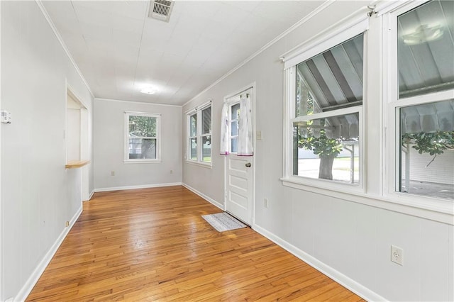 501 Gaudet Dr, Marrero, LA 70072 - unfurnished room with ornamental molding, light wood-style floors, and baseboards