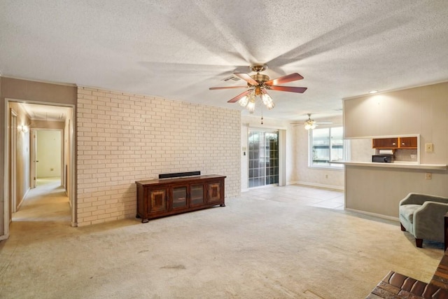 1400 Velma St, Metairie, LA 70001 - carpeted living room featuring ceiling fan, a textured ceiling, and attic access