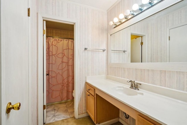 1400 Velma St, Metairie, LA 70001 - full bathroom featuring vanity, wallpapered walls, toilet, ornamental molding, and a shower with curtain
