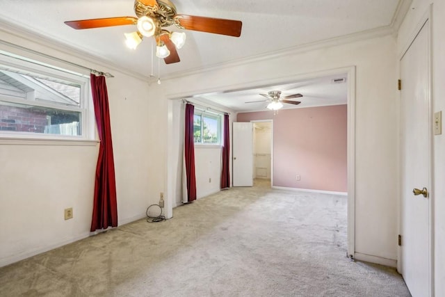 1400 Velma St, Metairie, LA 70001 - carpeted empty room featuring a ceiling fan, crown molding, and baseboards