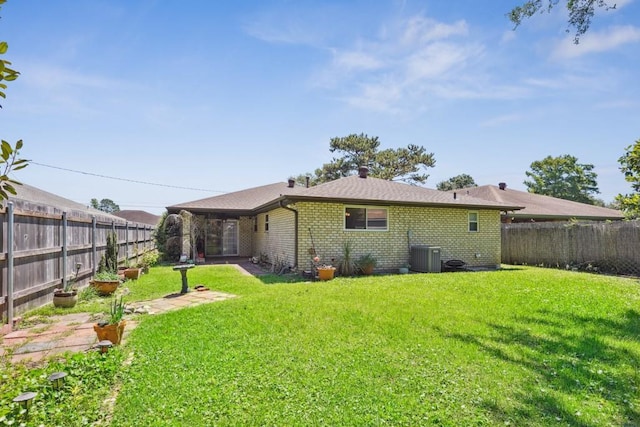 1400 Velma St, Metairie, LA 70001 - rear view of property with brick siding and central AC