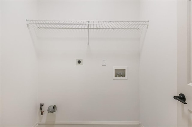 2308 Crossing Ct, Mandeville, LA 70448 - laundry area featuring washer hookup, electric dryer hookup, hookup for a gas dryer, and baseboards
